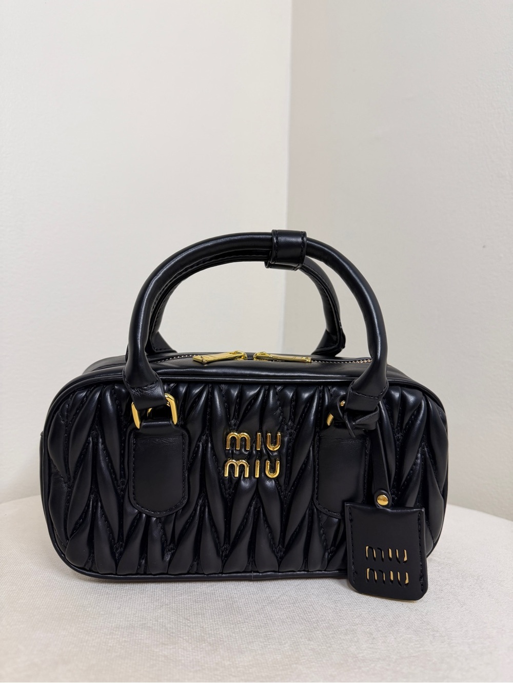 Miu Miu Black Quilted Matelassé Leather Satchel with Gold Hardware